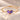 Demi Heart Bracelet in gold with February amethyst and June alexandrite pear-cut stones forming a heart