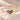 Demi Heart Bracelet in gold with February amethyst and August peridot pear-cut stones forming a heart