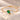 Demi Heart Bracelet in gold with May emerald and April diamond pear-cut stones forming a heart
