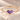 Demi Heart Bracelet in gold with June alexandrite and February amethyst pear-cut stones forming a heart