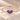 Demi Heart Bracelet in gold with two June alexandrite pear-cut stones forming a heart