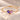 Demi Heart Bracelet in gold with June alexandrite and October pink tourmaline pear-cut stones forming a heart
