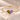 Demi Heart Bracelet in gold with August peridot and February amethyst pear-cut stones forming a heart