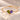 Demi Heart Bracelet in gold with August peridot and June alexandrite pear-cut stones forming a heart