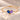 Demi Heart Bracelet in gold with September sapphire and February amethyst pear-cut stones forming a heart