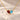 Demi Heart Necklace in gold with January garnet and March aquamarine pear-cut stones forming a heart