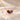 Demi Heart Necklace in gold with January garnet and June alexandrite pear-cut stones forming a heart