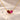 Demi Heart Necklace in gold with January garnet and July ruby pear-cut stones forming a heart