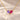 Demi Heart Necklace in gold with February amethyst and July ruby pear-cut stones forming a heart
