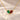 Demi Heart Necklace in gold with May emerald and January garnet pear-cut stones forming a heart