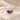 Demi Heart Necklace in gold with September sapphire and June alexandrite pear-cut stones forming a heart