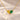 Demi Heart Necklace in gold with November topaz and May emerald pear-cut stones forming a heart