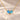 Demi Heart Necklace in gold with December zircon and March aquamarine pear-cut stones forming a heart