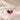 Demi Heart Necklace in silver with January garnet and July ruby pear-cut stones forming a heart