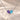 Demi Heart Necklace in silver with June alexandrite and March aquamarine pear-cut stones forming a heart
