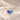 Demi Heart Necklace in silver with June alexandrite and December zircon pear-cut stones forming a heart