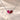 Demi Heart Necklace in silver with July ruby and January garnet pear-cut stones forming a heart
