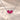 Demi Heart Necklace in silver with two July ruby pear-cut stones forming a heart